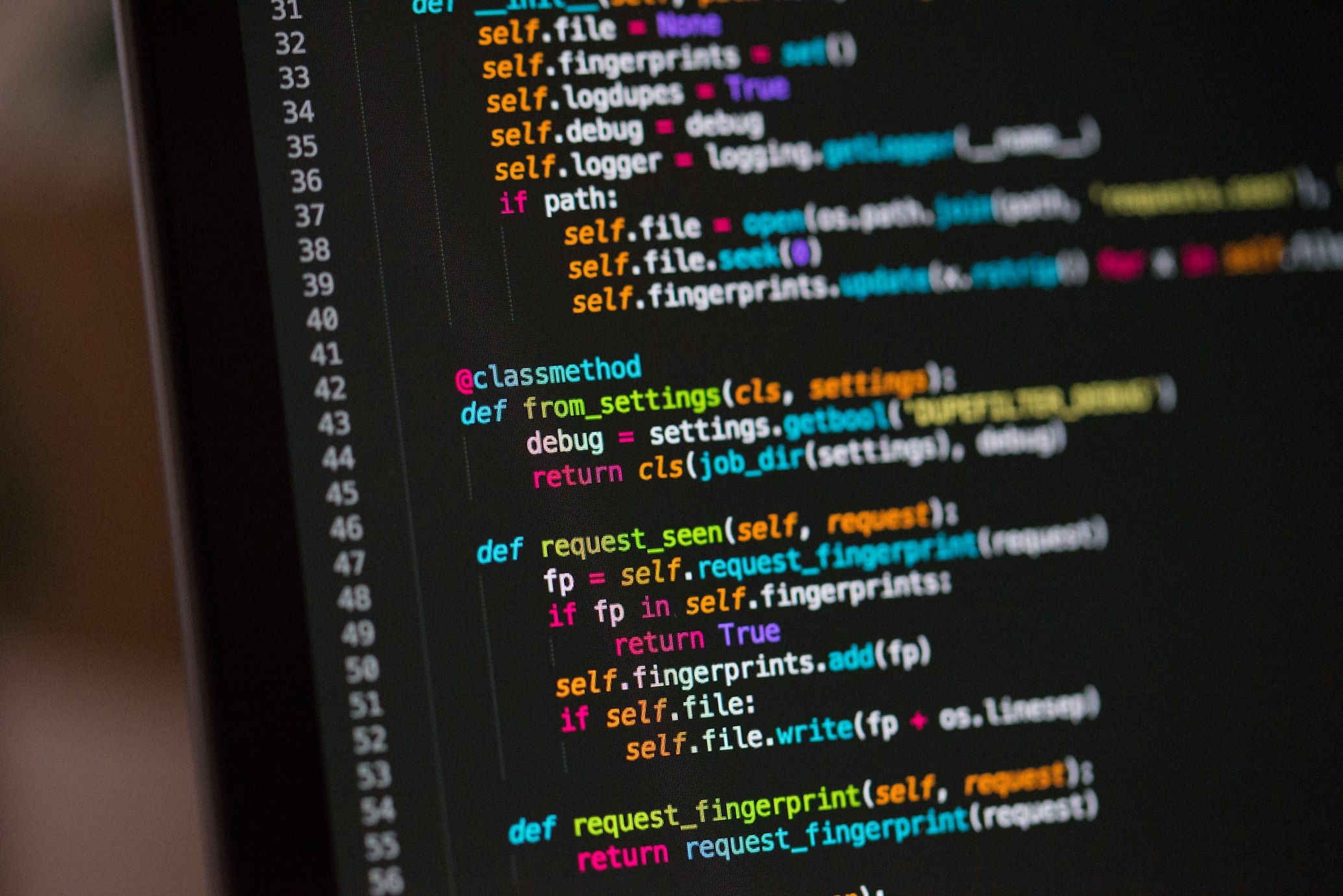 Developer writing software code